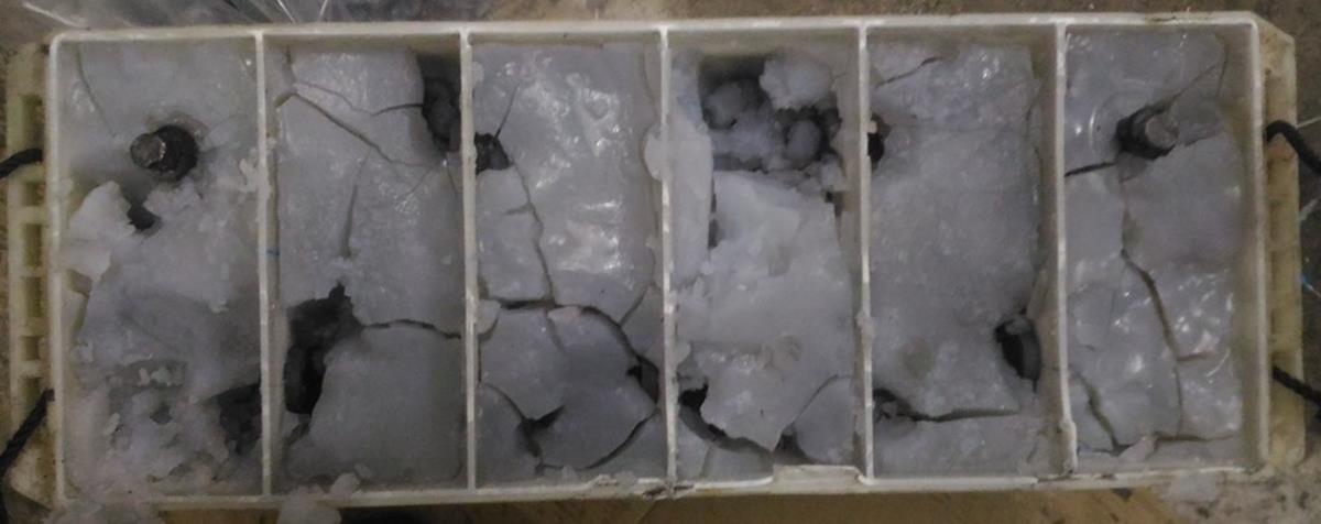 Tubular gel battery teardown showing severe gel cracking after high water loss life test