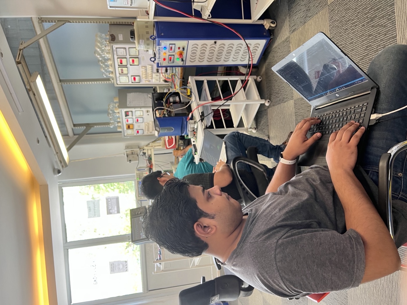 R&D lab — engineers at the workbench